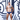 Male model posing against graffiti wall wearing navy MaleBasics briefs with white waistband from the Big & Tall collection.