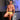 Male model in kitchen wearing yellow printed trunks with black waistband from the Malebasics Trunks collection.