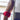 Male model leaning by a window wearing red lace boxer briefs from the Malebasics Sexy Underwear collection.