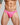 Person wearing a bright pink lace thong against a gray background