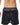 Premium mens satin shorts black back view.