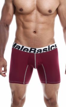 Malebasics boxer brief, crafted from a blend of microfiber polyester and lycra, featuring a mid-thigh cut and supportive front pouch. Adorned with a luxe waistband showcasing the Malebasics logo. Ethically produced in Colombia, embodying a fusion of Canad